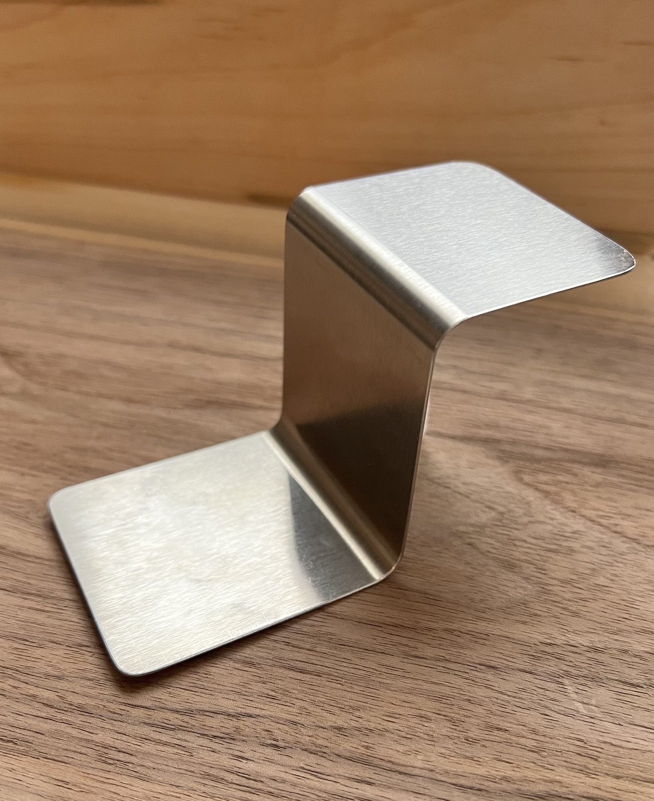 Z-Scoop stainless steel cutter and server on a wooden counter